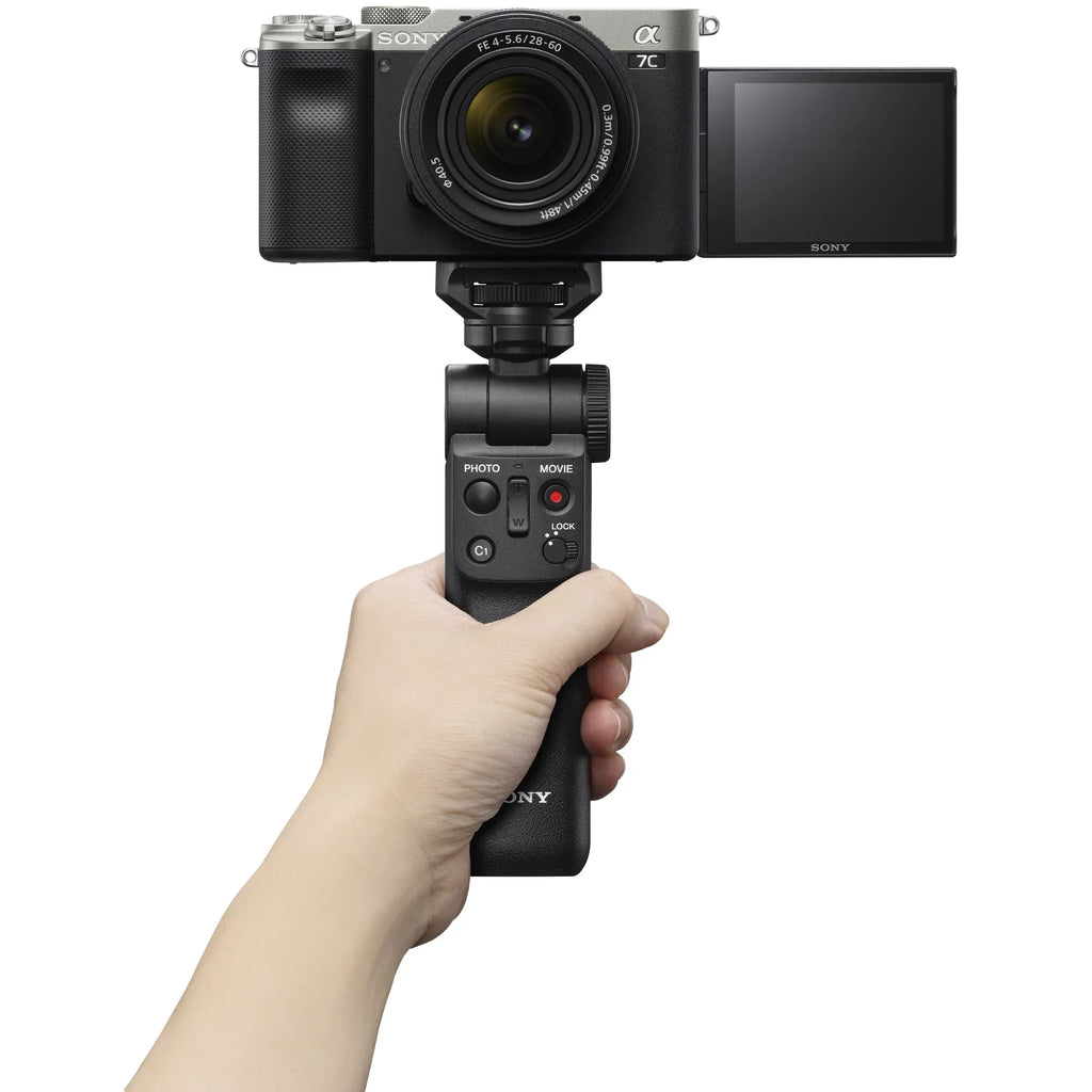 Sizeony a7C Mirrorless Full Frame Camera Body with 28-60mm F4-5.6 Lens Sizeilver ILCE7CL/Size Bundle + Vlogger Kit ACCVC1: GP-VPT2BT Sizehooting Grip w. Wireless Remote + 2x Battery + Deco Gear Bag & Accessories